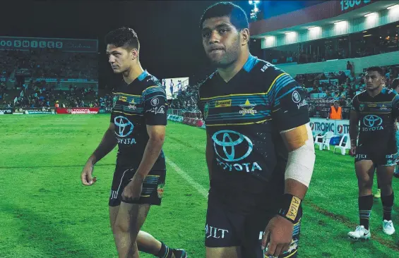  ?? INJURIES: Cowboys players Kalyn Ponga and John Asiata after North Queensland’s loss to the Cronulla Sharks on Saturday. Picture: ZAK SIMMONDS ??