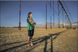  ?? Irfan Khan Los Angeles Times ?? ALFALFA grower Claudia Ethun says she quit farming in Inyokern, Calif., because she could not afford the local water district’s “replenishm­ent fee.”