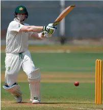  ?? AFP ?? Steve Smith plays a shot during the first day of three-day practice match in Mumbai on Friday. —