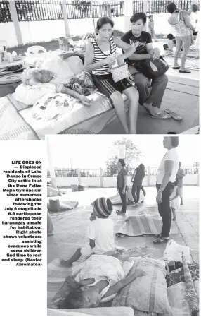  ??  ?? LIFE GOES ON — Displaced residents of Lake Danao in Ormoc City settle in at the Dona Feliza Mejia Gymnasium since numerous aftershock­s following the July 6 magnitude 6.5 earthquake rendered their baranagay unsafe for habitation. Right photo shows...