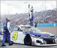  ?? Jared C. Tilton / Getty Images ?? Chase Elliott celebrates after winning the NASCAR Cup Series Season Finale 500 on Sunday. It was Elliott’s first Cup championsh­ip.