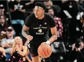  ?? Sam Craft/Associated Press ?? Texas A&M’s Wade Taylor IV has excelled on the court and in the classroom, drawing the admiration of Aggies head coach Buzz Williams.