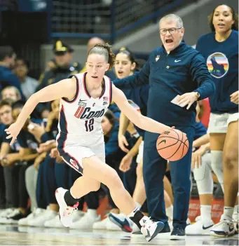  ?? CLOE POISSON/SPECIAL TO THE COURANT ?? Uconn guard Ashlynn Shade runs up the court after stealing the ball from Villanova guard Lucy Olsen in the first half Feb. 28 at Gampel Pavilion in Storrs.