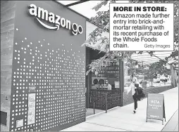  ??  ?? MORE IN STORE: Amazon made further entry into brick-andmortar retailing with its recent purchase of the Whole Foods chain.