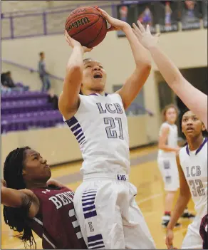  ?? Terrance Armstard/News-Times ?? Taking aim: El Dorado's Mekaylan Hicks shoots during the Lady Wildcats' contest against Benton during the 6A West Conference Tournament. El Dorado opens play in the 6A State Tournament today against Little Rock Hall.