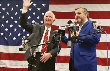  ?? Kim Chandler / Associated Press ?? U.S. Rep. Mo Brooks (left) waves during a campaign appearance with Texas Sen. Ted Cruz in Huntsville, Ala. Former President Donald Trump rescinded his support for Brooks, endorsing his rival, Katie Britt.