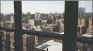  ?? (AP/Mark Lennihan) ?? The Lillys’ 14th floor apartment overlooks other apartment buildings in the Bronx borough of New York.