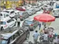  ?? HT FILE ?? Cars parked at a market in New Delhi.