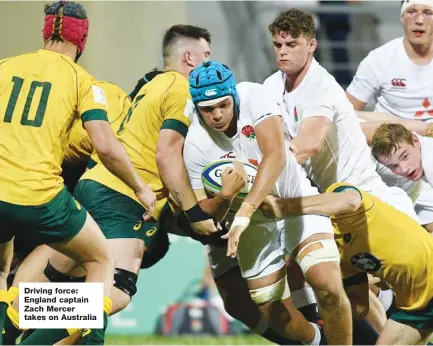  ??  ?? Driving force: England captain Zach Mercer takes on Australia