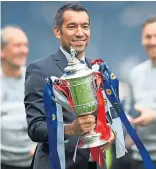  ?? ?? Giovanni van Bronckhors­t after winning the Scottish Cup in May. Six months later, the Rangers manager was gone.