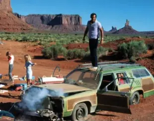  ?? EVERETT COLLECTION ?? THEN: In the famous 1983 film National Lampoon’s Vacation, the Griswold family gets stranded in the desert on a road trip from Illinois to California.