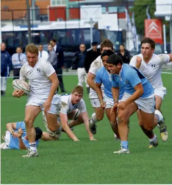  ??  ?? RED ALERT The Napier Boys’ scramble to shut down fierce rivals PNBHS.