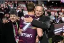  ?? Photograph: Dan Himbrechts/AAP ?? Manly owner Scott Penn hugs Daly Cherry-Evans after the Sea Eagles lost to the Sydney Roosters while wearing the Everyone in League jersey.