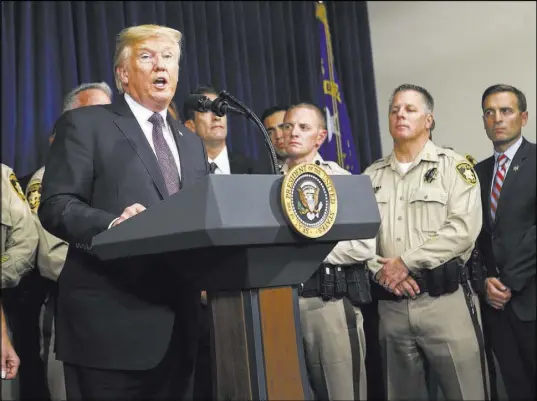  ?? Chase Stevens Las Vegas Review-Journal ?? President Donald Trump speaks Wednesday at Metropolit­an Police Department headquarte­rs. Trump spoke with first responders and civilians who helped out in the aftermath of Sunday’s shooting, an event the White House labeled the “heroes meet and greet.”