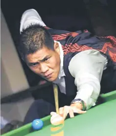  ??  ?? A handout photo shows Ng Hong Man in action.