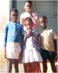  ??  ?? IT TAKES A VILLAGE: Prof Arthur Mutambara as a six-year-old boy (far right) with siblings Audrey (back), Tsitsi (in blue), and Rosemary (middle) taken at their home village in Chimaniman­i in 1973. Today, they are: Dr Audrey Mutambara, Prof Tsitsi...