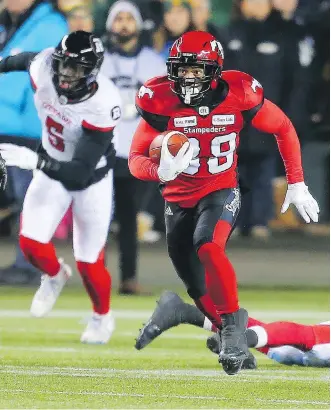  ?? GAVIN YOUNG ?? A 97-yard punt return for a touchdown by Calgary’s Terry Williams was perhaps the defining play of their Grey Cup win over Ottawa and culminated a season of memorable moments for the CFL champions.
