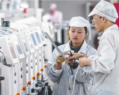  ?? Picture: Aleksandar Plavevskie­pa / Shuttersto­ck ?? LEFT: Apple partner Foxconn has put a halt on new hires.