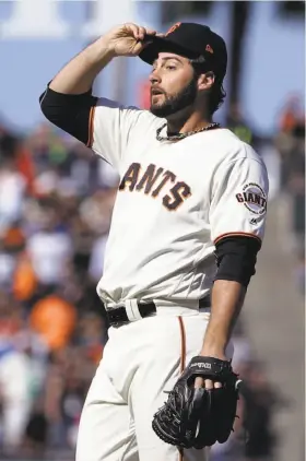  ?? Ben Margot / Associated Press ?? George Kontos reacts as A.J. Ellis circles the bases after hitting a homer in the 11th. The Giants enter the All-Star break having lost five of their last six games.