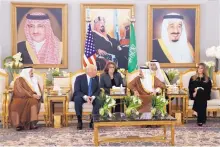  ?? EVAN VUCCI/ASSOCIATED PRESS ?? President Donald Trump meets with Saudi King Salman after a welcome ceremony at the Royal Terminal of King Khalid Internatio­nal Airport on Saturday in Riyadh, Saudi Arabia.