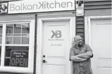  ?? ANDREW WATERMAN THE TELEGRAM ?? Eldin Husic outside his restaurant, Balkan Kitchen, in downtown St. John’s..