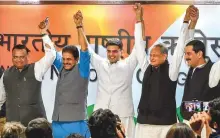  ?? PTI ?? ■ Rajasthan Congress president Sachin Pilot (centre) and chief minister-designate Ashok Gehlot (second right) at the party’s headquarte­rs in New Delhi yesterday.