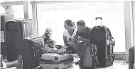  ?? JERMAINE BARNABY/FREELANCE PHOTOGRAPH­ER ?? Persons at Norman Manley Internatio­nal Airport following the cancellati­on of flights on Saturday, September 10.