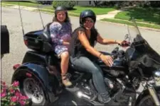  ?? SUBMITTED PHOTO ?? Barb Tullio of Drexel Hill Davidson Tri Glide Ultra is pictured recently on her Harley with granddaugh­ter Ava Wink, 10.