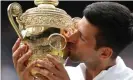  ?? Paul Childs/Reuters ?? Novak Djokovic’s Wimbledon triumph in July drew him level with Roger Federer and Rafael Nadal on 20 grand slam titles. Photograph: