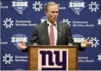  ?? SETH WENIG — THE ASSOCIATED PRESS ?? John Mara, co-owner of the New York Giants, speaks to reporters after firing coach head Ben McAdoo and general manager Jerry Reese on Monday.