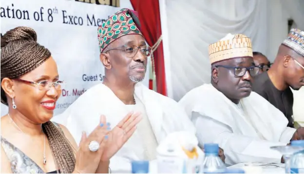  ?? PHOTO: Abdul Musa ?? From Left: Chairman, IoD Abuja Zone, Princess Edith Aguele; President & Chairman, Council of Institute of Directors Nigeria, Chief Chris Okunowo; Chairman, Rain Integrated Services Limited, Tijjani Tumsah, during the investitur­e/inaugurati­on of 8th executive committee members, in Abuja yesterday