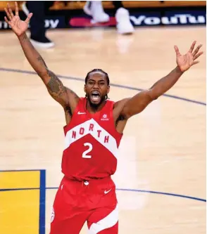  ?? Foto: dpa/Frank Gunn ?? Torontos Kawhi Leonard feiert Kanadas ersten Titel seit 1993.