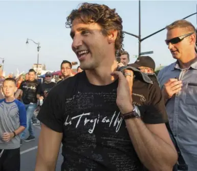  ?? ADAM HUGGINS/THE NEW YORK TIMES ?? Hip fan Justin Trudeau was compliment­ed by Gord Downie — but also challenged to do more for First Nations people.