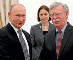  ?? AP. ?? The INF treaty was on the table when US National security adviser John Bolton, right, met up with Russian President Vladimir Putin in Moscow.