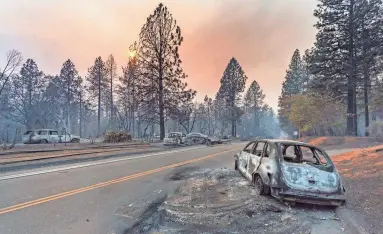  ??  ?? The Camp Fire has swept through Paradise, Calif., destroying thousands of homes.