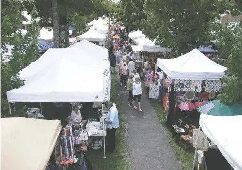  ?? FACEBOOK. COM ?? Vendors’ tents line paths through the Beersheba Springs Assembly Grounds. The 52nd Beersheba Springs Arts and Crafts Festival is Aug. 25-26.