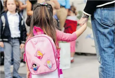  ?? ANNE- CHRISTINE POUJOULAT/ AFP/ GETTY IMAGES FILES ?? Time with mom acquires a corporate edge as the simple pleasures of early childhood get subverted by competitiv­e parents who resort to expensive preschool tutoring to get their kids into New York City’s elite kindergart­en classes.