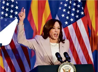  ?? FREDERIC J. BROWN/AFP VIA GETTY IMAGES ?? Vice President Kamala Harris, speaking in Tucson on Friday, called the new restrictio­ns on abortion in more than a dozen states “Trump abortion bans.”