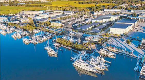  ??  ?? An artist’s impression of stages three and four of The Boat Works expansion. The services hub buildings are pictured right of centre with the four superyacht sheds behind the hub.