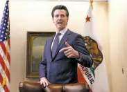  ?? Rich Pedroncell­i / Associated Press ?? Gov. Gavin Newsom discusses his decision to fire the head of the state’s oil and gas regulatory agency.