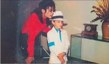  ?? Sundance Institute ?? MICHAEL JACKSON with Wade Robson, who, now as an adult, says in the doc that the singer molested him.