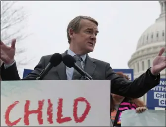  ?? MARIAM ZUHAIB — THE ASSOCIATED PRESS ?? Sen. Michael Bennet, D- Colo., speaks during a news conference on the Child Tax Credit on Wednesday on Capitol Hill in Washington. Bennet has been a leading advocate in the Senate for first the expansion of the Child Tax Credit, the push to keep it from expiring and now the fight to keep the increased benefit from the Tax Cuts and Jobs Act from rolling back in 2025.