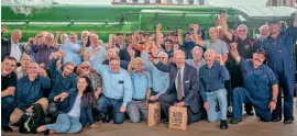  ??  ?? With the locomotive itself providing the backcloth, Transport Heritage New South Wales’ staff and volunteers celebrate the return of restored Pacific No. 3801 after it was relaunched on March 12. THNSW/STEVE BURROWS