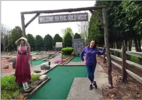  ?? ZACHARY SRNIS — THE MORNING JOURNAL ?? Caree Hayden, owner of Sundae Funday, stands at the entrance to the business’ mini golf course.