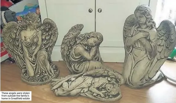  ??  ?? These angels were stolen from outside the family’s home in Greatfield estate