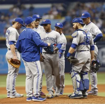  ?? BRIAN BLANCO/GETTY IMAGES ?? Marcus Stroman pitched into the ninth inning in his first opening-day start, getting the Rays to hit into one groundout after another.