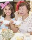  ??  ?? Delia Suplig of Timex with daughter Camille