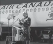  ?? Canadian Press file photo ?? Air Canada president and chief executive officer Calin Rovinescu, shown unveiling the airline’s new Airbus A220 in January, will step down as the company’s head in February.