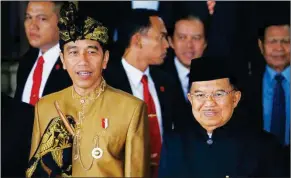  ??  ?? WILLY KURNIAWAN/REUTERS Indonesia’s President Joko Widodo and Vice President Jusuf Kalla depart after the president’s address ahead of Independen­ce Day at the parliament building in Jakarta, Indonesia.