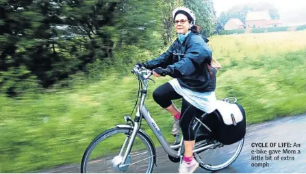  ??  ?? CYCLE OF LIFE: An e-bike gave Mom a little bit of extra oomph